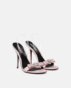 Gianni Ribbon Slingback Sandals 4.3" / 110 mm Pink | VERSACE US Luxury Open Toe Heels With Bow Straps, Evening Sandals With Transparent Straps And Open Heel, Luxury Heels With Bow Straps For Spring, Luxury Heels With Bow Straps And Open Heel, Elegant Formal Sandals With Transparent Straps, Luxury Open Heel Heels With Bow Straps, Luxury Slingback Pumps For Party With Buckle Closure, Chic Evening Sandals With Transparent Straps, Luxury Party Slingback Pumps With Buckle