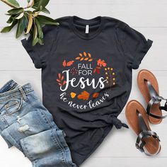 Fall For Jesus He Never Leaves,Fall Jesus Shirt, Womens Fall Shirt, Faith Tee, Fall Shirt, Thanksgiving Shirt,Ladies Fall Shirt,Autumn Shirt F I T ∙ & ∙ S I Z I N G : -->These Unisex T-shirts have a modern-fit. Consult the size chart in the pics for an accurate fit. -->Women's sizes are narrower than the waist. -->Sleeves are rolled up in some product pictures. They do not come rolled up on delivery. T I M E ∙ T O ∙ D E L I V E R Y : -->Processing and production time is 1-2 business days. -->Del Fall For Jesus, Bible Shirts, Fall Shirts Women, Faith Tees, Autumn T Shirts, Jesus Shirt, Leaves Fall, Grateful Thankful Blessed, Jesus Tshirts