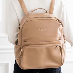 Elkie Co Aspen Backpack Tan on a model Leather Diaper Bag Backpack, Stylish Diaper Bag, Backpack Diaper Bag, Vegan Leather Backpack, Stylish Purse, Sparks Joy, Vegan Leather Bag, Diaper Bag Backpack, Baby Diaper