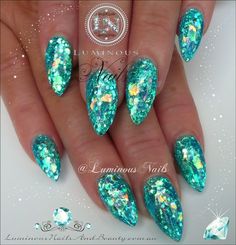 why not to go for a nail art that portrays sea and a sea creature like mermaid who is almost everyone’s favorite mystical creature. Mermaid nails refer to any nail enhancement or gel service with a thin layer of an extra fine iridescent glitter over the top. Here we collected 60 most popular mermaid acrylic nails for you. Luminous Nails, Teal Nails, Trendy Nail Design, Prom Nails, Stiletto Nails, Love Nails