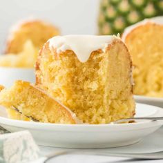 a close up of a slice of cake on a plate with a fork in it