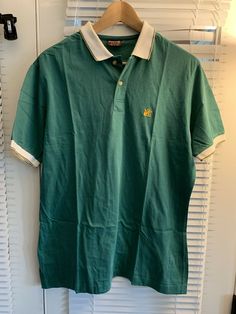 Vintage Chaps Ralph Lauren Polo Shirt 80s Mens Large L Horse Polo Mallet Logo. Retro Green Short Sleeve Polo Shirt, Vintage Green Short Sleeve Polo Shirt, Vintage Green Polo Shirt With Polo Collar, Retro Green Collared T-shirt, Vintage Green Cotton Polo Shirt, Vintage Fitted Cotton Polo Shirt, Vintage Green Collared T-shirt, 80s Polo Shirt, Uncle Vanya