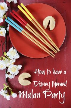 a red plate with chopsticks and chinese new year's eve at home