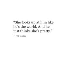 a quote from eva foxella that reads she looks up at him like he's the world and he just thinks she's pretty