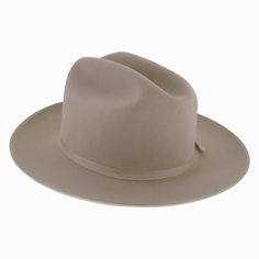 The American-made Stetson Open Road has been crafted of Royal Deluxe Fur Felt, a material that repels moisture and is highly durable. It features a cattleman crown surrounded by a narrow grosgrain ribbon hat band and a ribbon-bound brim. The Open Road's easy styling allows it to transition from country to city wear and looks equally stylish on a man or woman. The interior is fully lined and offers a Roan inner band. Add this investment piece of headwear to your hat collection and instantly eleva