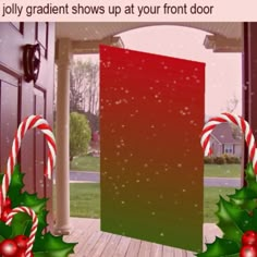 a red door with candy canes and holly on the front porch for christmas time