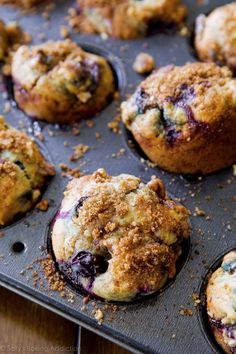 freshly baked blueberry muffins in a baking pan