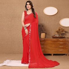 Red colored saree is prettified with beautiful embroidered butti work as shown which makes it appear classy. This saree is made of georgette fabric which is accompanied with banglori silk blouse piece which you can customise as per your design/style. Women can buy this saree to wear for their party and functions. Note:- The actual product may differ slightly in color and design from the one illustrated in the images when compared with computer or mobile screen Measurements: Saree : Georgette : 5 Saree Georgette, Mobile Screen, Georgette Saree, Georgette Fabric, Georgette Sarees, Style Women, Blouse Piece, Silk Blouse, Design Style