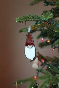 an ornament hanging from a christmas tree