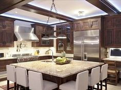 an image of a kitchen island with seating