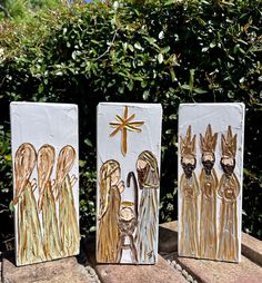 three handmade nativity cards with gold foil on them