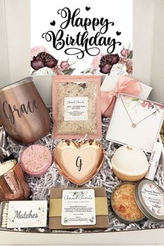 a valentine's day gift box filled with cookies, coffee mugs and other items