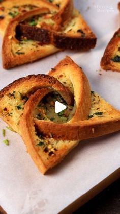 four pieces of bread on a white tray