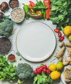 a table topped with lots of different types of vegetables