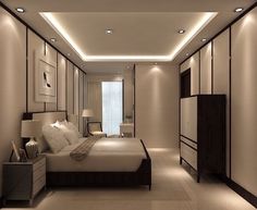 a bedroom with a bed, dressers and lamps on either side of the room