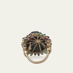 Stephen Dweck ring Approx. 1.03" tall 18-karat yellow gold Hand-carved ruby zoisite Prong-set white diamonds Emeralds and rhodolite garnet Zoisite total carat weight: 33.0 Garnet total carat weight: 2.0 Emerald total carat weight: 1.0 Diamond total carat weight: 0.25 Imported Luxury Multi-stone Cluster Ring, Luxury Tourmaline Rings With Rose Cut Diamonds, Luxury Tsavorite Ring With Gemstone Accents, Luxury Tourmaline Ring With Center Stone, Luxury Yellow Gold Tourmaline Emerald Ring, Collectible Multi-stone Emerald Ring, Luxury Multi-stone Tourmaline Ring, Luxury Tourmaline Emerald Ring, Luxury Tourmaline Cabochon Rings