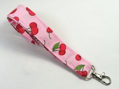 This cute lanyard has perfect design of red cherries. It is perfect for any occasion. You can leave me a convoy if you need a different size. You can have a wardrobe of lanyard to match your outfit. This lanyard is made of soft 100% cotton fabric to give a comfortable feel around your neck. This lanyard is easy to take care. You can spot clean and throw in a washer and hang dry. If you want you can iron and it is ready to use. These lanyards are perfect if you have metal allergy. Each of these lanyards will have a slight different pattern depending on where fabric is cut on pattern. This lanyard measures 21 inches long on one side and it is 3/4 inch wide or 42 inches long all over around neck. Multiple orders are welcome and I take custom orders too on all my lanyards. All the products are Lanyard Pink, Cute Lanyard, Cute Lanyards, Fabric Lanyard, Have Metal, Badge Holder, Badge Holders Lanyard, Badge Holders, Different Patterns