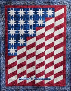 an american flag quilted on the side of a wall