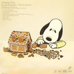 a snoopy dog is eating from a gingerbread house with his paws on the ground