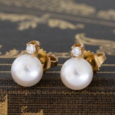 These sweet diamond and pearl stud earrings are such a sweet and classic duo, a perfect daily earring, or even a bridal moment! Pearl studs are having a moment right now, and we love that these incorporate a little diamond sparkle at the posts. They're also from T&Co - an added bonus if you ask us! 18kt yellow gold Diamonds are estimated to be G/H colors & VVS clarities. GIA standards Please see qualitative report for more information. Diamond Earrings For Gifts, Timeless Yellow Gold Bridal Earrings For Anniversary, Elegant Timeless Earrings For Anniversary, Elegant Diamond Earrings With Timeless Design, Elegant Timeless Diamond Earrings For Anniversary, Timeless Yellow Gold Bridal Earrings, Refined Yellow Gold Pearl Earrings For Anniversary, Elegant Earrings With Timeless Design As Gift, Timeless Diamond Earrings For Wedding