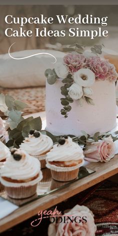 Cupcake Wedding cake Ideas Simple Simple Cupcake Wedding Display, Wedding Cake And Cupcake Ideas, Rustic Wedding Cupcakes Ideas Simple, Wedding Cupcakes And Small Cake, Rustic Boho Wedding Cake And Cupcakes, Small Wedding Cake With Cupcakes, Cupcake Wedding Cake Ideas, Wedding Cupcakes Display, Simple Wedding Cupcakes