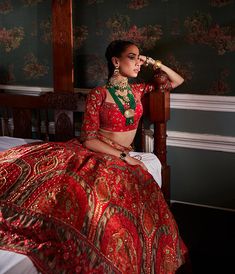 Editor's Note Featuring an elegant interplay of mughal and chintz motifs with intricate hand embroidery on the lehenga. It is paired with a meticulously embroidered blouse with intricate thread and hand beadwork on yoke and sleeves and styled with a co-ordinated dupatta. Fabric: Blouse: viscose silk, dupatta: net, lehenga skirt: viscose silk Color: Hot pink/orange Components: Lehenga, blouse and dupatta Occasion: Sangeet and Wedding Guest Care: Dry Clean Only About the Designer Kalista is a luxu Chintz Motifs, Blouse Yoke, Personal Shopping Service, Lehenga Skirt, Embroidered Lehenga, Modern Embroidery, Silk Dupatta, Embroidered Blouse, Fashion Labels