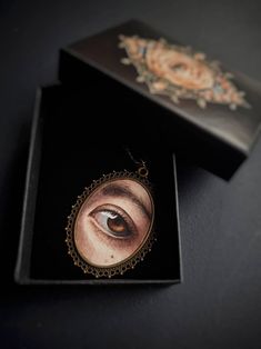 "Custom Lover's Eye Pendant /Lover's Eye Miniature/ Custom Vintage Pendant/ Custom Eye Portrait Eye miniatures, also known as lover's eye were popular in the late 1700's and 1800's. Normally watercolour on ivory, depicting the eye or eyes of a spouse, loved one, a child. This is wonderful and truly unique Wedding, Mother's Day, Birthday or Anniversary gift. Special way to capture your loved one and have it near your heart, or give a bit of yourself to someone you care about. It can be a memory o Eye Portrait, Bathroom Paintings, Lovers Eyes, Custom Eyes, Small Gift Boxes, Eye Pendant, Vintage Pendant, Slovenia, Unique Wedding