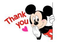 a mickey mouse holding onto the side of a sign with thank you written on it