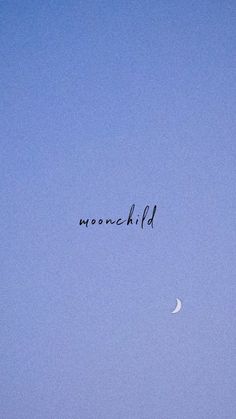 the word moonchild written in black ink against a blue sky with a half moon