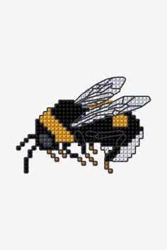 a black and yellow bee is shown in the middle of a cross stitch pattern on a white background