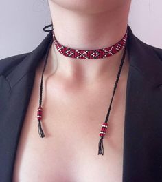 Red seed bead Сhoker Traditional Sylianka necklace boho necklace jewelry gift for her Necklace of red  color with pattern (red and black colors) 100% Handmade  quality beads Bead length - 28cm/11.02in + chain Wedth - 1.4cm/0.55in The necklace has ties with which it will fit beautifully on any neck. If you need to change the length of the necklace - write a message. I will adjust the length to your size for free! How to care for your jewelry🌸 To ensure that your jewelry will serve you for a long Boho Seed Bead Necklace, Red Bohemian Beaded Necklace For Gift, Bohemian Red Beaded Necklace For Gift, Bohemian Choker With Tiny Beads For Gift, Bohemian Beaded Choker Necklace As Gift, Handmade Red Bohemian Necklace, Bohemian Black Choker For Jewelry Making, Handmade Adjustable Red Choker, Traditional Adjustable Beaded Choker Necklace