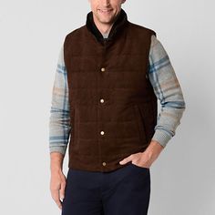 This Stafford men's vest has a stylish rugged look that's perfect for layering when there's a chill. Made from a woven fabric with a faux suede effect, this sleeveless vest has slip pockets plus snap button and zip closures. Wear it over a sweater with jeans and boots. Closure Type: SnapFit: Regular FitPockets: 2 Front Slip PocketsSleeve Length: SleevelessApparel Length: 27.5 InchesFiber Content: 100% PolyesterFabric Description: WovenFilling Content: 100% PolyesterLining Material: PolyesterCare Rugged Fall Vest Outerwear, Rugged Brown Vest Outerwear, Brown Rugged Vest For Winter, Rugged Brown Winter Vest, Brown Rugged Winter Vest, Rugged Brown Vest For Fall, Brown Cotton Outerwear For Layering, Brown Vest Men, Sweater With Jeans