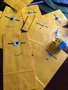 yellow envelopes with faces and eyes on them