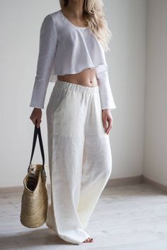 "Model wearing size S/172 cm/5'7\" tall. Linen very long comfortable loose trousers. Side pockets. Pants waist with elastic. Natural soft linen. Details * weight: 205 g/m² or 6.05 oz/yd² * 100% natural Baltic linen * softened * breathable, anti-allergic * light, very durable and strong * easy to wash * suitable for children * OEKO-TEX® Standard 100 certified (guarantees you that it meets ecological requirements) Model wears size S, 172 cm/5'7\" tall. GARMENTS ARE DESIGNED FOR 164-176 CM HEIGHT ( Linen Palazzo Pants, Wide Leg Linen Trousers, Linen Overalls, Short Blouses, Linen Romper, Summer Linen Dresses, Loose Trousers, Linen Jumpsuit, Blue Jumpsuits