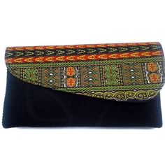 split This is the perfect clutch for every woman’s outfit. It fits all your essentials - Nothing more, nothing less. It is a perfect gift to self or to another woman in your life! It was handcrafted in Kenya using burlap and Kente (African print) fabric Length: 10.5 Inches Width: 5.5 inches ***The clutch pattern is on the black image. Black Clutch Purse, Elegant Clutch, Clutch Pattern, Black Clutch Bags, Clutch Purse Black, Printed Clutch, Black Image, Black Clutch, African Prints