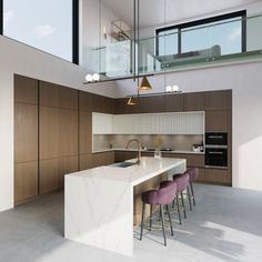 a kitchen with marble counter tops and bar stools next to an open floor plan