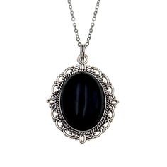 "Elegant oval black onyx pendant set in a beautiful frame in silver tone. This black pendant necklace features genuine polished black onyx stone set in a silver frame. It's is a nice big size pendant which will definitely not go unnoticed. It includes a matching stainless steel cable-link chain that secures with a traditional lobster clasp. The last photo shows the lovely design on the back of the pendant. Charming black gemstone pendant necklace makes a great gift. Measurements(Approx, see 3rd photo) Chain Length: 18\"(including clasp) Pendant Measurements:40x30mm Black onyx :25x18mm Also available in a smaller size https://www.etsy.com/listing/1311176144/" Gothic Silver Oval Necklace, Black Oval Pendant Necklace For Gift, Classic Black Oval Pendant Necklace, Classic Oval Onyx Necklaces, Classic Black Oval Pendant Jewelry, Vintage Black Cabochon Necklace, Elegant Black Cabochon Necklace, Black Stone Pendant, Photo Chain