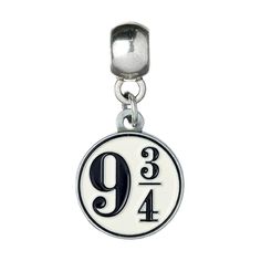 Harry Potter Silver Plated Charm 9 & 3 QuartersHarry Potter Silver Plated Charm 9 & 3 Quarters is an official product from our Harry Potter merchandise collection. The product comes from our Jewellery & Watch brand. The perfect gift for any Harry Potter fan.Details Silver plated slider charm with highly detailed design. The famous Platform 9 & 3 quarters sign on a charm bail. Universal sized charm compatible with most charm bracelets. Official licensed product. Fallout Merchandise, Resurrection Stone, Harry Potter Charm Bracelet, Harry Potter Bracelet, Magical Objects, Harry Potter Platform, Deathly Hallows Symbol, Pokemon Merchandise, Harry Potter Charms