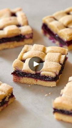 several pieces of pie sitting on top of a baking sheet