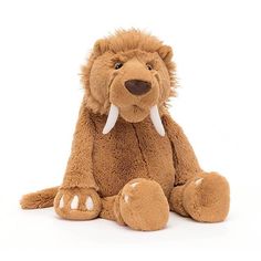 a brown stuffed animal sitting on top of a white floor