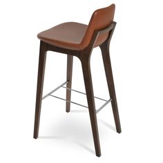 a brown leather bar stool with wooden legs