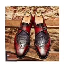 Elevate your shoe game with these bespoke leather handmade shoes. Made with genuine leather, these oxfords come in burgundy, and are available in all US, UK, EU, and AU sizes. The comfortable insole and standard shoe width make them perfect for any occasion. Designed with a solid pattern and lace-up closure, these handmade shoes are a vintage addition to any wardrobe. The leather outsole adds durability and longevity to these unique boots. Customize them to your liking with personalization optio Leather Oxfords With Crocodile Pattern And Pointed Toe, Brown Crocodile Pattern Wingtip Leather Shoes, Brown Crocodile Pattern Leather Wingtip Shoes, Pointed Toe Leather Shoes With Crocodile Pattern, Leather Shoes With Crocodile Pattern And Round Toe, Business Dress Shoes With Crocodile Pattern Leather, Leather Monk Strap Shoes With Crocodile Pattern, Leather Wingtip Oxfords With Crocodile Pattern, Wingtip Leather Shoes With Crocodile Pattern