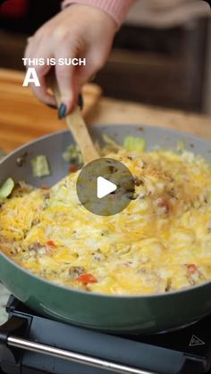 someone is cooking food in a skillet on the stove