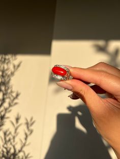 Rare, stunning eye-catching cocktail ring featuring top grade Japanese Aka Red Coral with Natural Diamonds in solid 18k white gold. Red Coral is  organic gem that comes with rich flaming hue. These naturally vibrant, underwater beauties take over thousands of years to form and transformed into a gemstone.  Metal: 18K solid white gold Gemstone: Natural OX Blood Red Coral, deep red in color, have no visible blemishes and well-cut, Natural Diamond G color, VS clarity. Color: vivid deep red Transparency: Opque Treatment: natural color, not treated Stone weight: coral-2.4 g diamond- 0.8ct total Total weight: 9.5 g Ring Size : size 7.5 (Able to resizing, please contact us)   Feel free to message us for more information. We hand-select conflict-free, high-quality materials and honoring the experi Red Coral Stone Ring, Coral Stone Ring, Family Jewelry, Pretty Accessories, Coral Ring, Taipei Taiwan, Family Jewellery, Coral Stone, Stunning Eyes