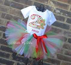 Current turnaround time is two weeks plus shipping time. Need it sooner? Just send a message. We will try our best to accommodate your timeframe. Additional costs may apply. ♥ Birthday tutu outfit in red, white, green, pink, and lime - Gingerbread Theme - TWO PIECE SET includes bodysuit or shirt with design pictured and tutu Shirt: All shirts/bodysuits come in short sleeves with design as pictured. Available in numbers 1-9. Longsleeve upgrades can be added here: http://www.etsy.com/listing/84379 White Tutu Outfit, Tutu Shirt, Gingerbread Theme, Halloween Tutu, White Tutu, Birthday Tutu Outfit, Birthday Party Outfits, Gingerbread Girl, Tutu Outfits