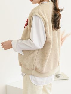 Soft and cosy round neck fleece cotton vest with printed letter on front. Model is wearing MINUSEY ONE SIZE. Please allow 5-12 days shipping when in restocking. * MINUSEY ONE SIZE = EU 34-38, US 2-6* 90% Cotton / 10% Polyester* Dry clean* Made in Korea - Model Height: 163cm/5'4" (US2, EU34) Cotton Vest, Fleece Vest, Bell Sleeve Top, Round Neck, Women's Top, How To Wear