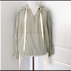 Pale Green Ribbon Sweater Size S Nwt Buttoned Neckline Green Long Sleeve Top With Drawstring, Casual Drawstring Hoodie Top, Green Drawstring Tops For Fall, Casual Hooded Top With Drawstring, Khaki Long Sleeve Sweatshirt For Spring, Green Hooded Top For Spring, Khaki Drawstring Hood Top For Fall, Khaki Hoodie Top For Fall, Green Long Sleeve Top With Drawstring Hood