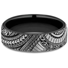 a black and white wedding band with an intricate design