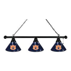 three lights hanging from a metal bar with the word auburn on it's side