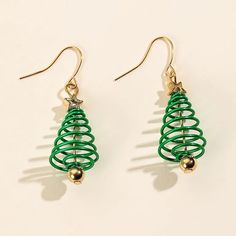 Christmas Tree Earrings Includes: ♥ 1 pair of earrings♥ 1 Free Kraft Paper Gift Box Product Details: Dimensions ♥ Length: 2-3/8 inches (5.4 cm)♥ Width: 5/8 inch (1.7 cm) Material♥ Alloy Type ♥ Christmas Tree Earrings, Christmas Jewelry, Dangle Drop Earrings, Holiday Earrings, Holiday Jewelry, Christmas Tree earrings, Xmas tree earrings, gift for her, Christmas party jewelry Green Earrings New Year Gift, Green Earrings For New Year Gift, Green Earrings Gift For New Year, Christmas Party Jewelry, Fashion Christmas Tree, Creative Christmas Trees, Tree Earrings, Christmas Tree Earrings, Alloy Earrings